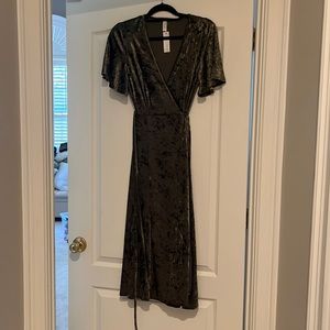 Olive green velvet wrap dress sold by Baltic Born